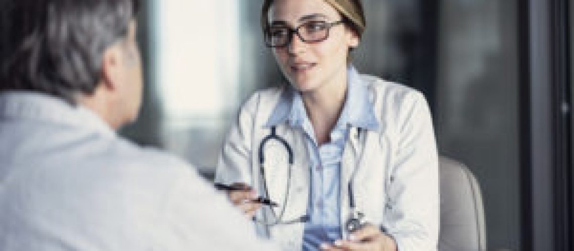 Doctor talking to the patient